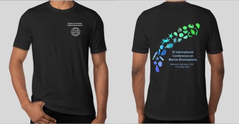 Black t-shirt, front and back, on a model. Front design: SSMB logo in white on the upper left chest. Back design: Silhouetted marine invertebrate larvae, colored in a bright gradient from indigo to lime green, arching over the conference name and dates in white text.
