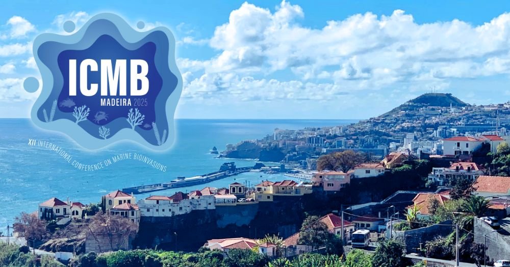Scenic view of Funchal, Madeira. Lush foliage and red tile roofed buildings descend a steep slope to a harbor, with mountains and ocean visible in the distance. Logo reads: ICMB Madeira 2025. XII International Conference on Marine Bioinvasions.